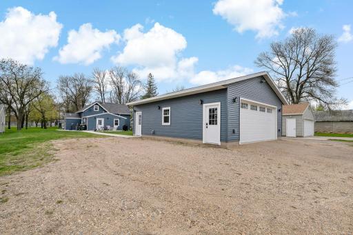 Off street parking PLUS big 32x26 garage with opener, heated, hot/cold running water, sheetrocked and finished