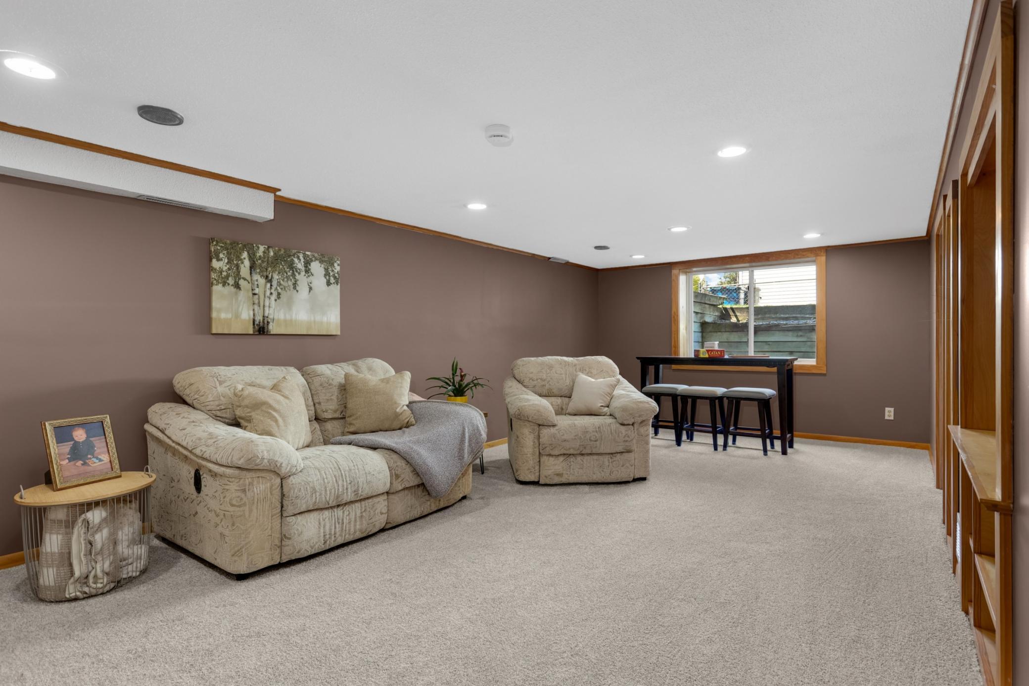 The finished family room has a large egress window and recessed lighting to ensure comfort in your basement.