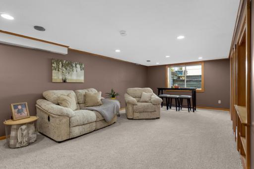 The finished family room has a large egress window and recessed lighting to ensure comfort in your basement.