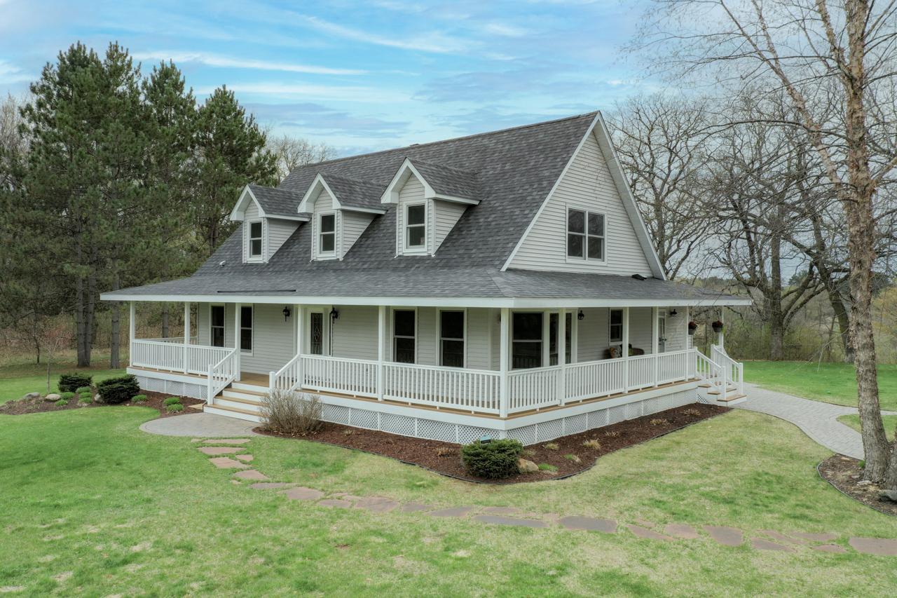Just look at that wrap around covered porch