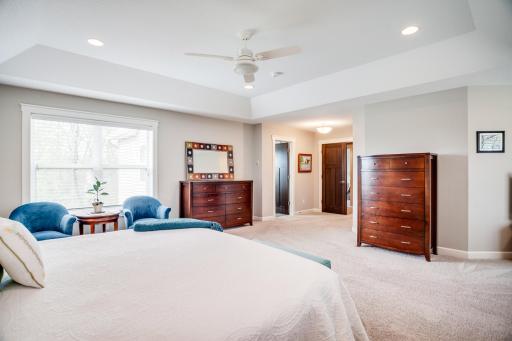 The suite also showcases a private, en-suite bath and huge walk-in closet.