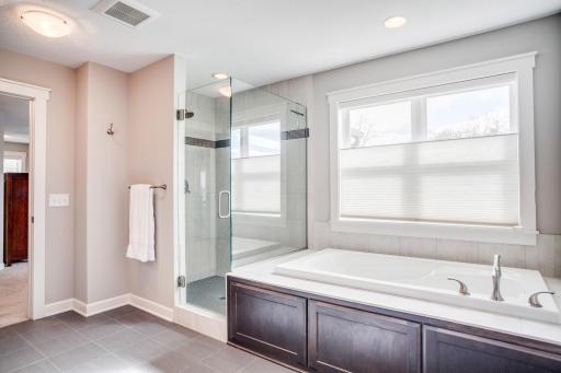 You will also find this relaxing soaking tub and walk-in tile shower.
