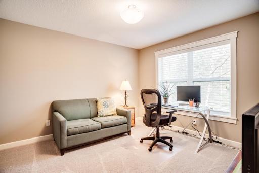 The two additional bedrooms are generously sized with neutral dÃ©cor and large windows.