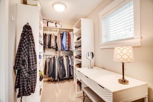 This is only half of the very spacious walk-in closet with organizers.