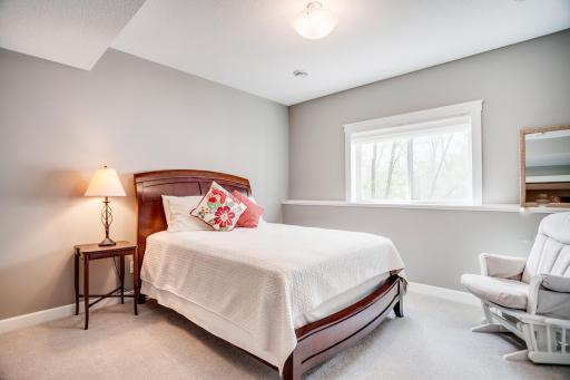 The lower level also includes a large fourth bedroom with walk-in closet...great for teens or guests who prefer a bit more privacy. There is also a substantial unfinished storage room offering excellent organization and flexibility.