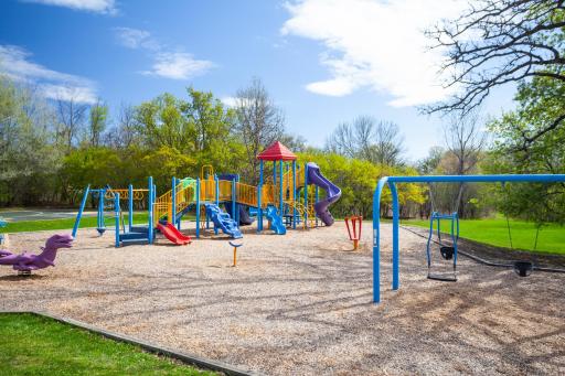 Just around the corner, Mayflower Park is a popular neighborhood park with a colorful playground, sport court, and open play areas surrounded by mature trees and nature views.