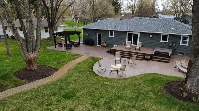 Ideal for entertaining and relaxing this back yard boasts a stamped concrete patio and low maintenance deck and gazebo.