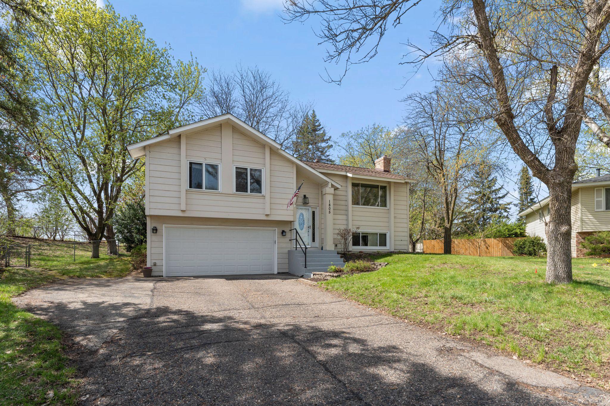 Large 2-car garage plus extra driveway parking