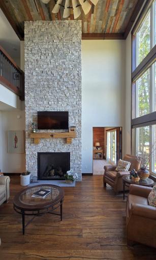 floor to ceiling dry stack stone fireplace.jpg