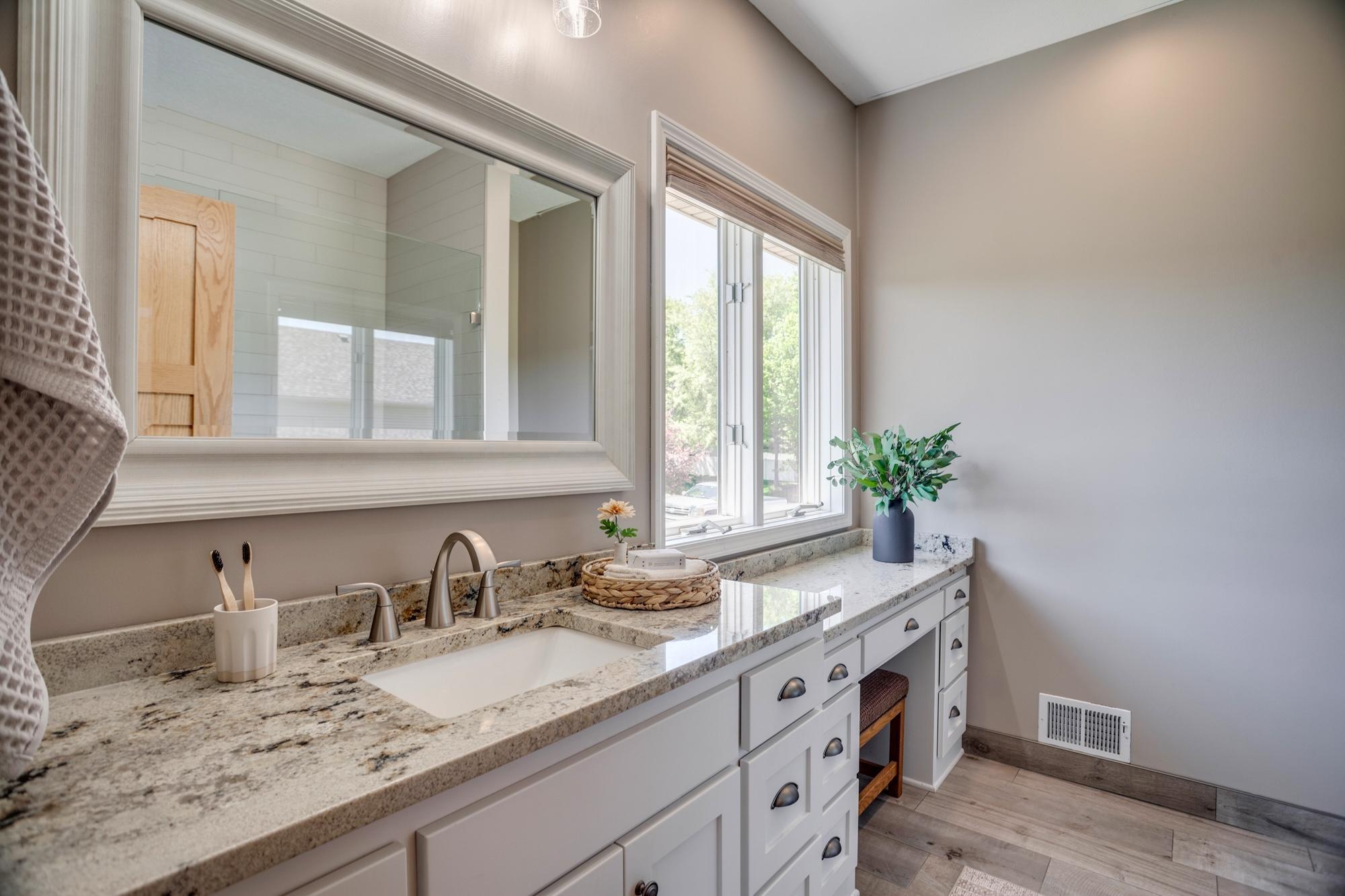 Ensuite bathroom with walk-in shower and oversized vanity