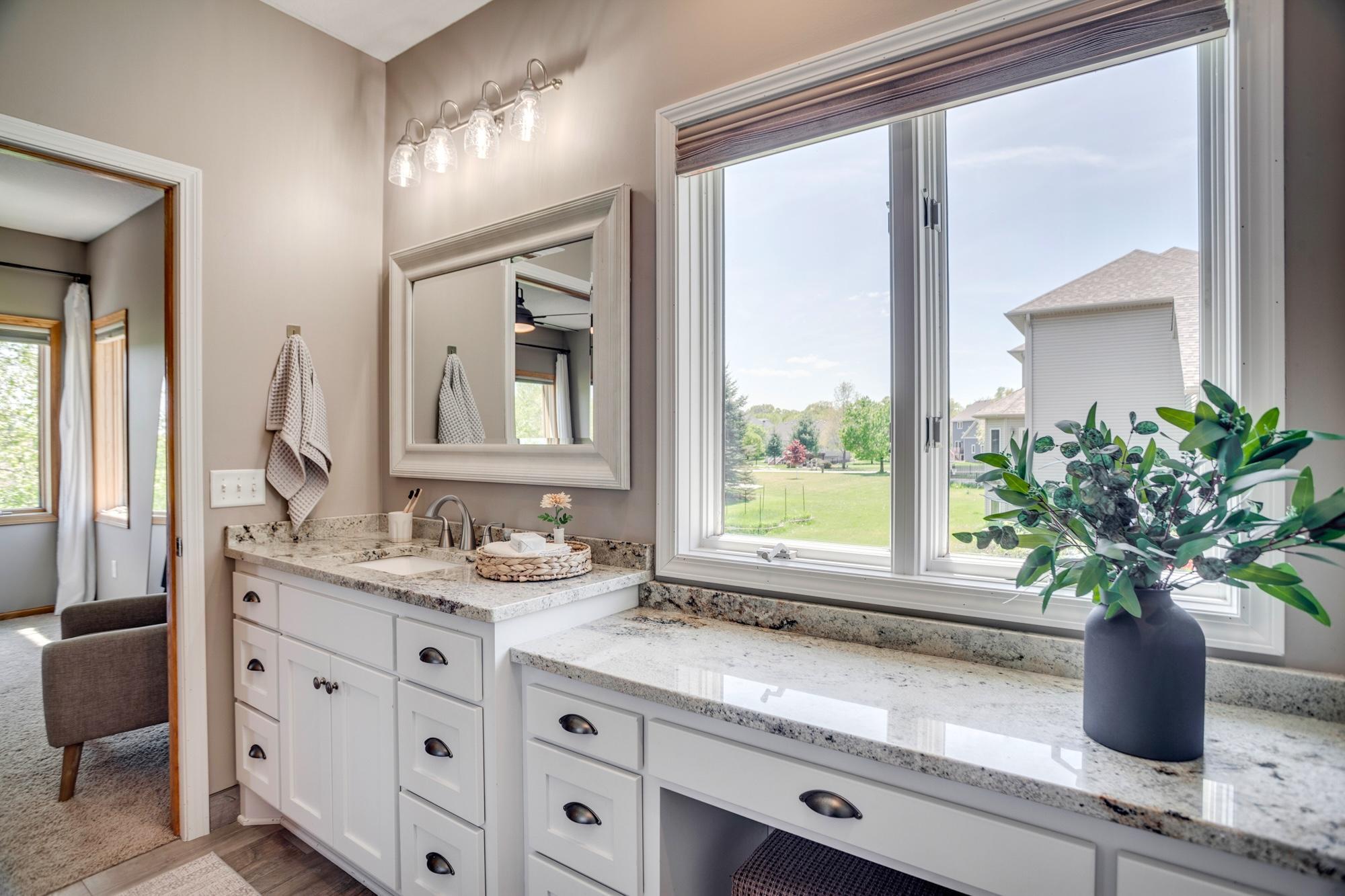 Ensuite bathroom with walk-in shower and oversized vanity
