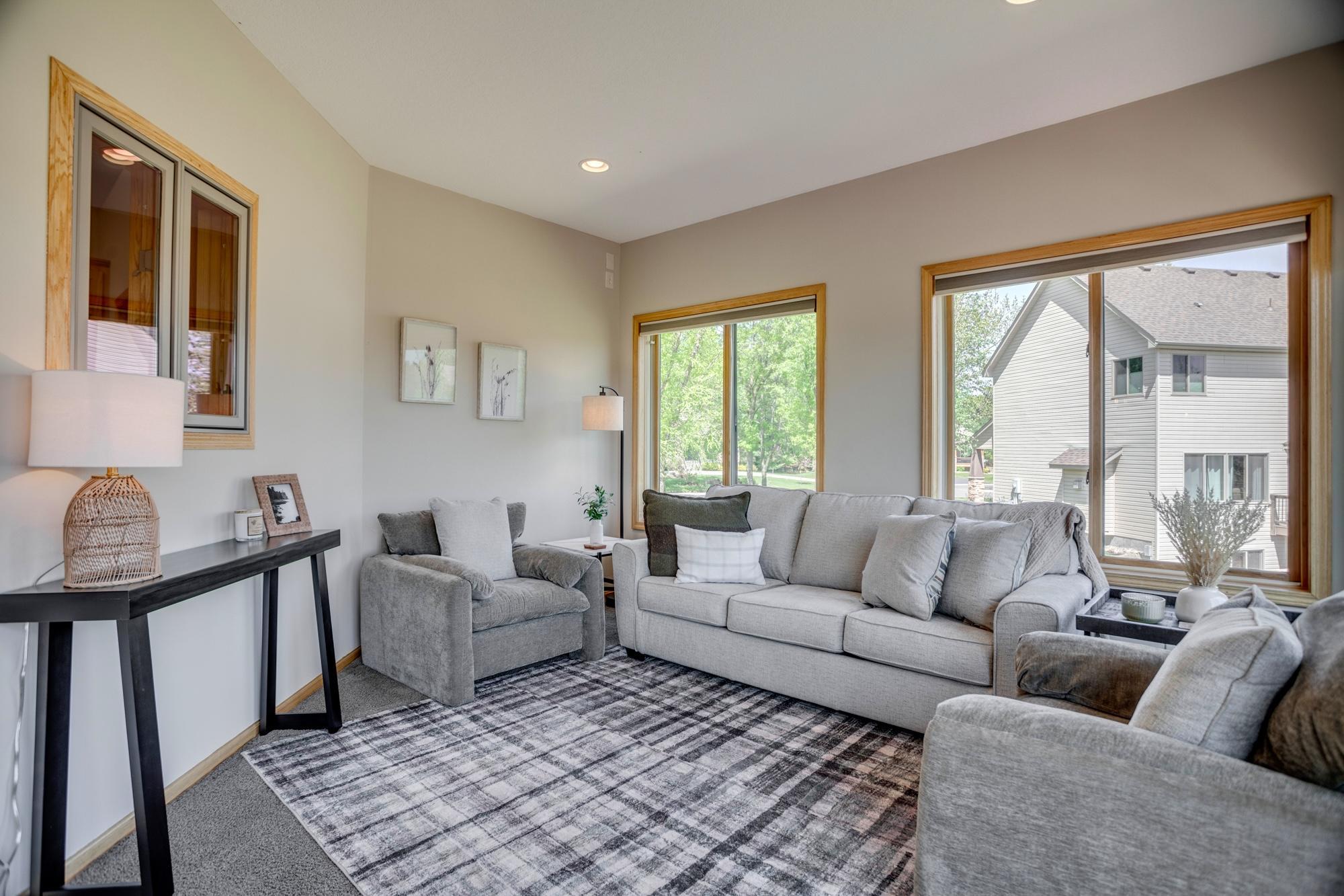 Sunroom with sliding glass doors that open to the deck