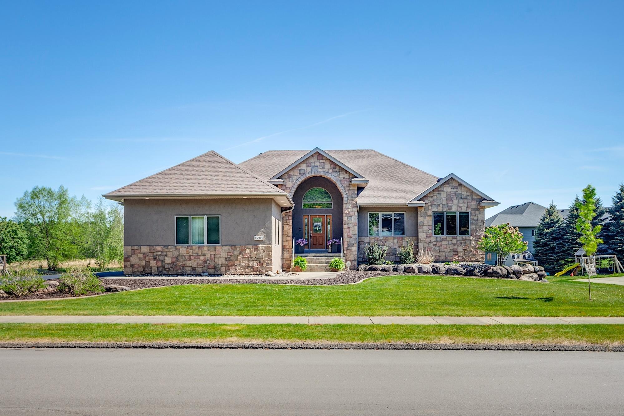 Welcome to 13506 210th Circle NW. This 4 bed, 3 bath home sits on a quiet cul-de-sac and features an open floor plan, main-level owner’s suite, and multiple entertaining spaces.