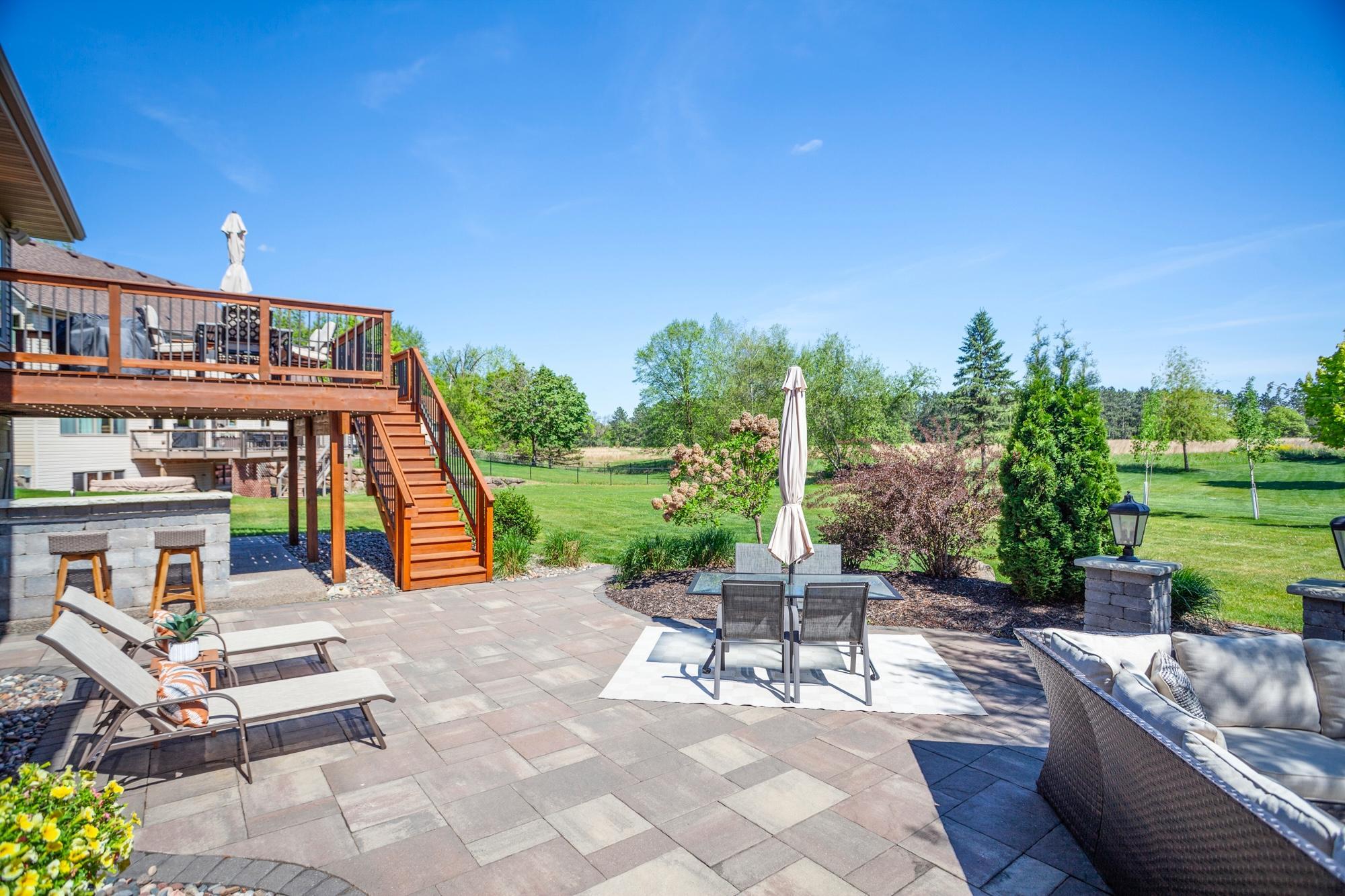 The patio offers sweeping prairie views that create the perfect backdrop for relaxing or entertaining