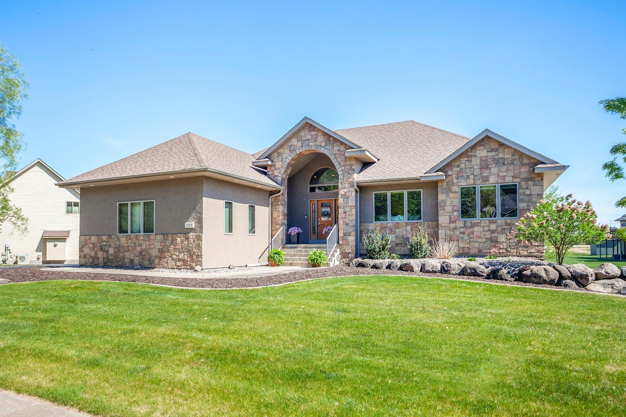 Welcome to 13506 210th Circle NW. This 4 bed, 3 bath home sits on a quiet cul-de-sac and features an open floor plan, main-level owner’s suite, and multiple entertaining spaces.