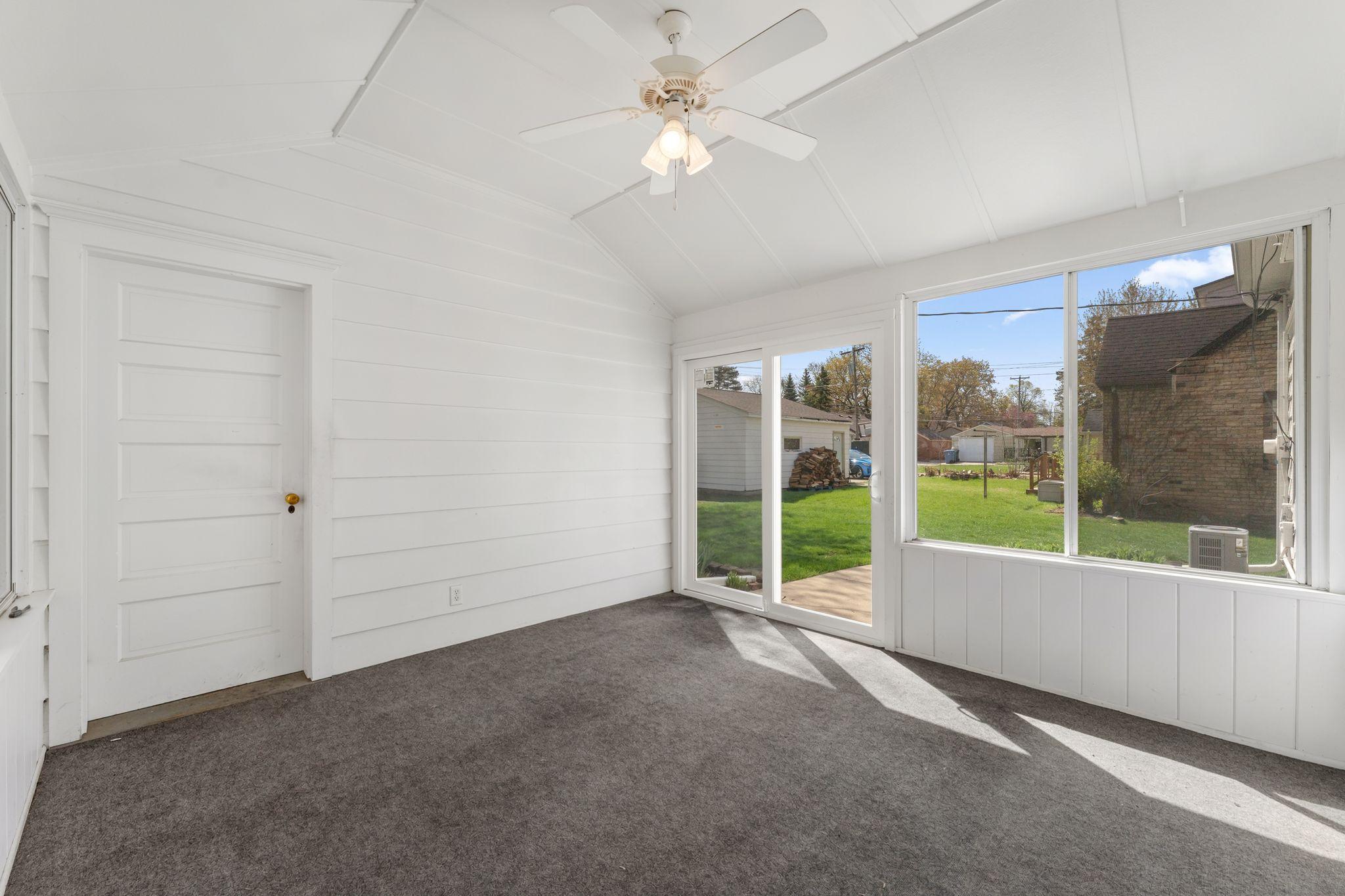 Porch with new sliding glass door.