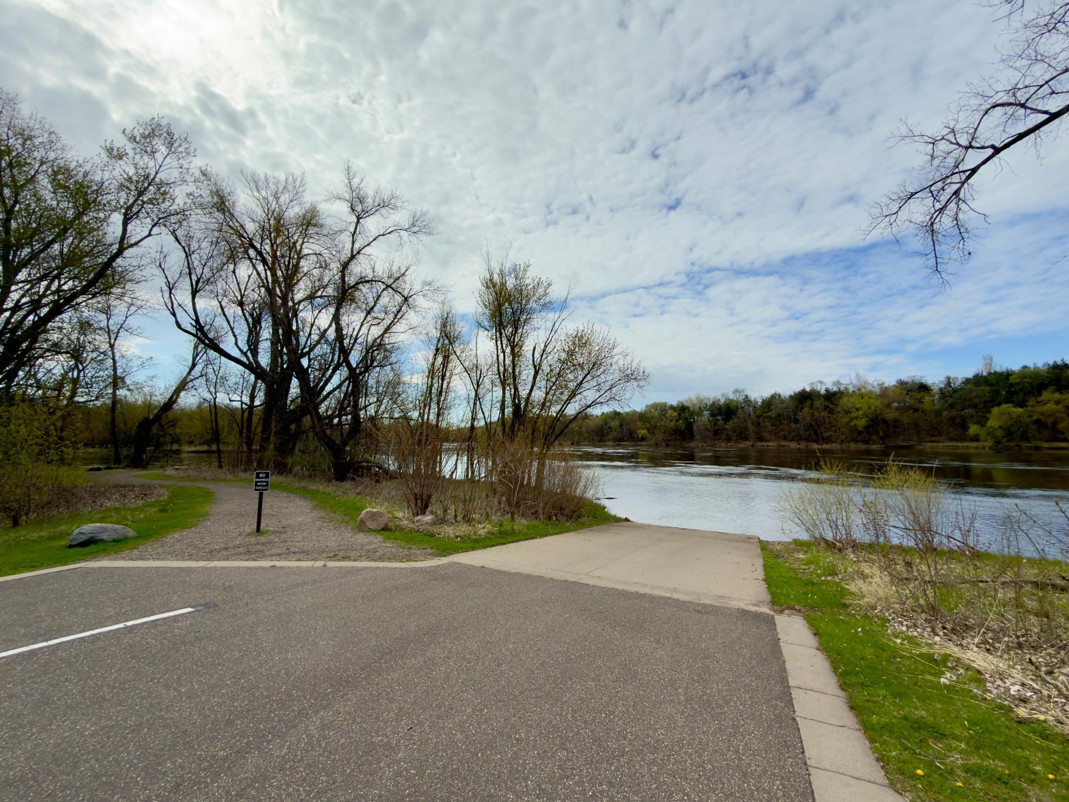 Sidewalks, trails and backroads can bring you all the way to the boat launch and amazing trails from this quiet neighborhood