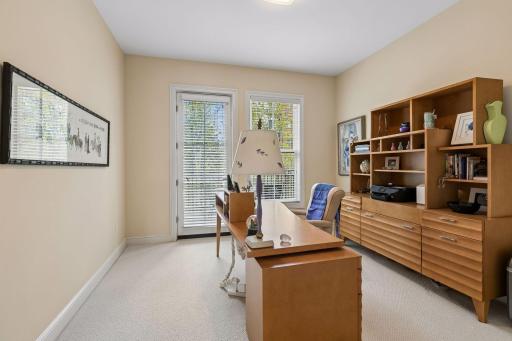 2nd bedroom with balcony. Currently used as an office