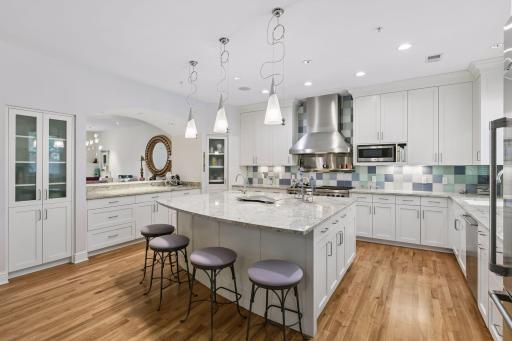 Spacious kitchen with large center island and extensive cabinetry