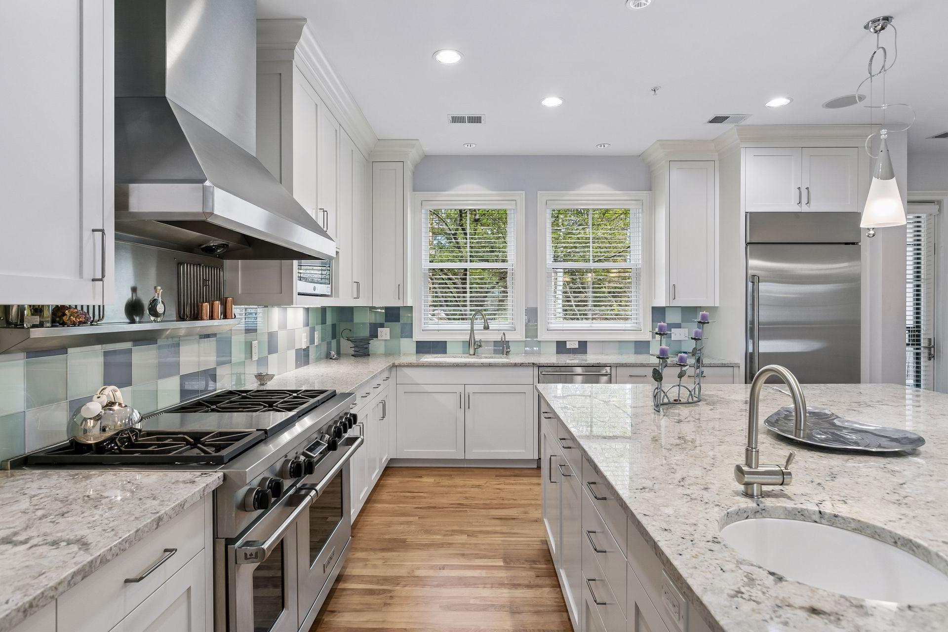 A Chef's dream kitchen which includes a Wolf range