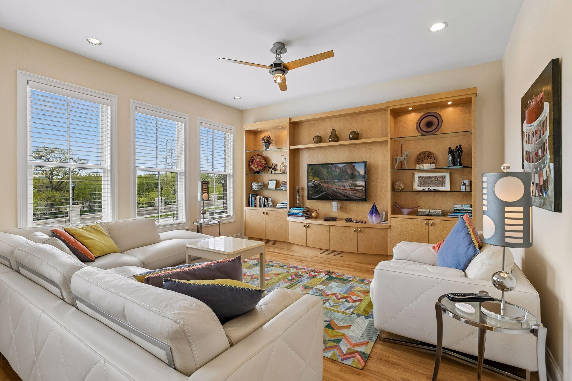 Family room with plenty of sunlight and automatice blinds