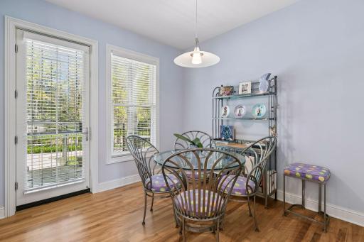 Informal dining space in the kitchen with access to the rear patio and grill