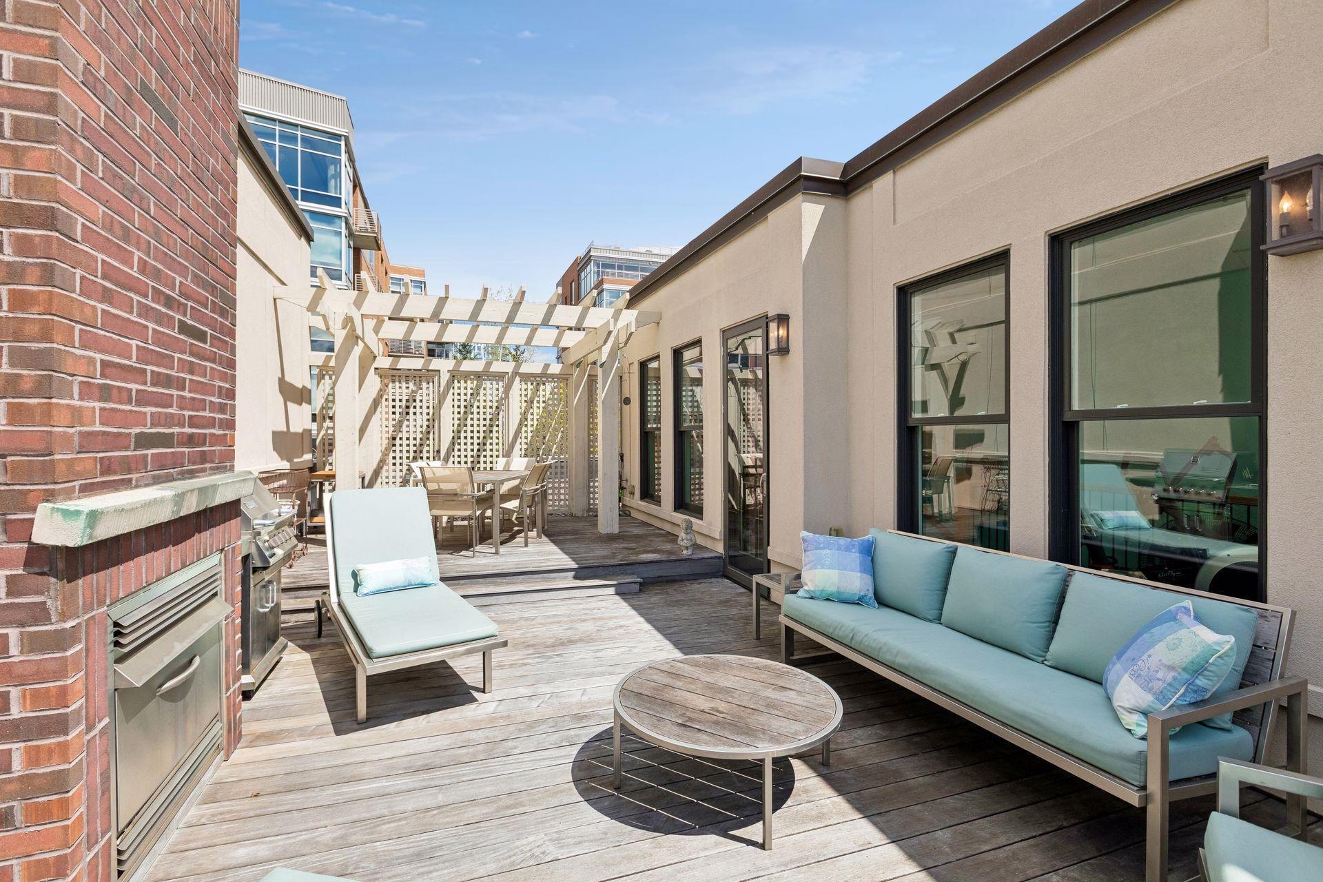 Spacious rooftop deck on the 3rd level. Complete with a gas fireplace and additional gas grill