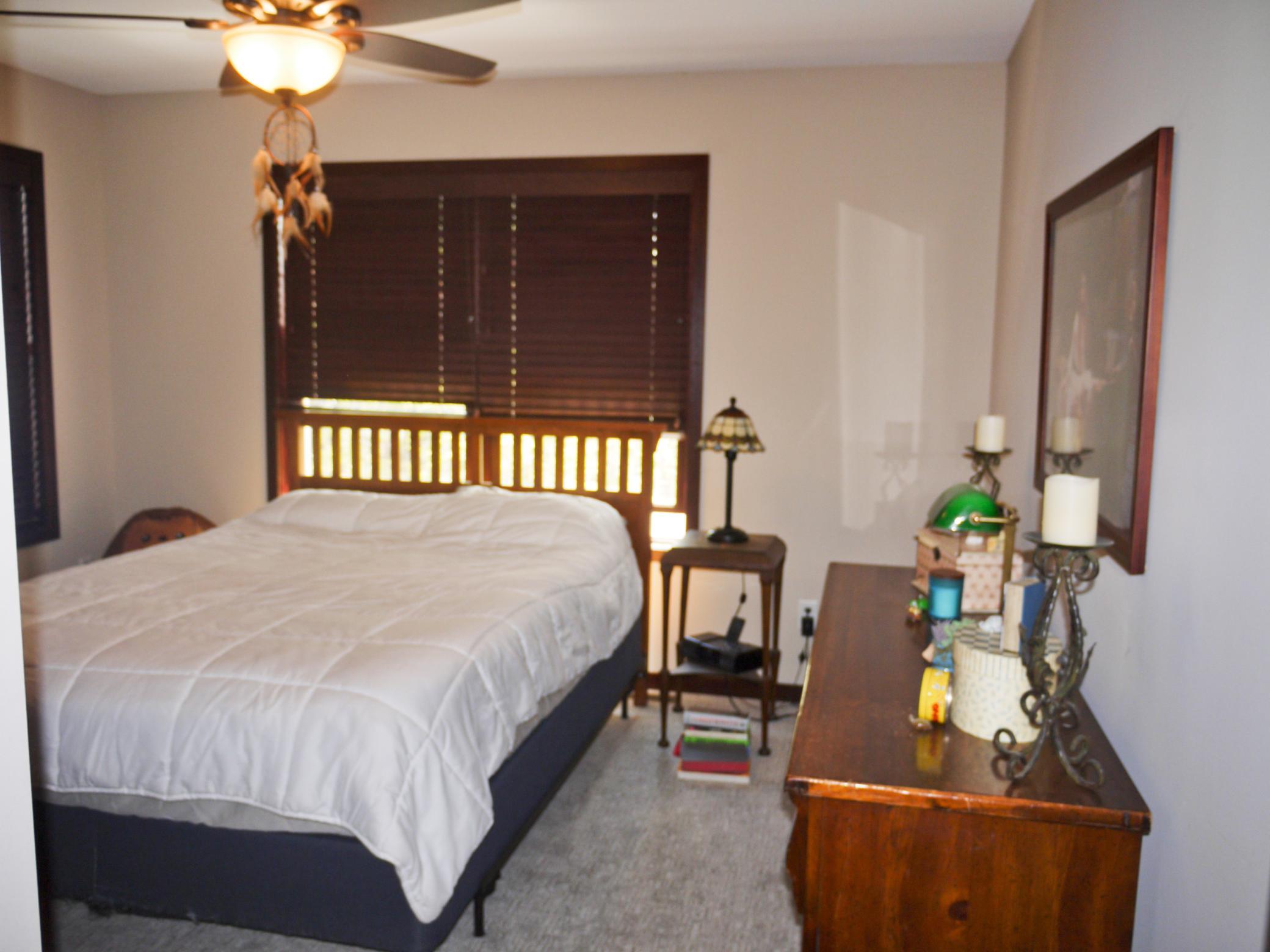 Upper level 3rd bedroom with south and east facing windows.jpg