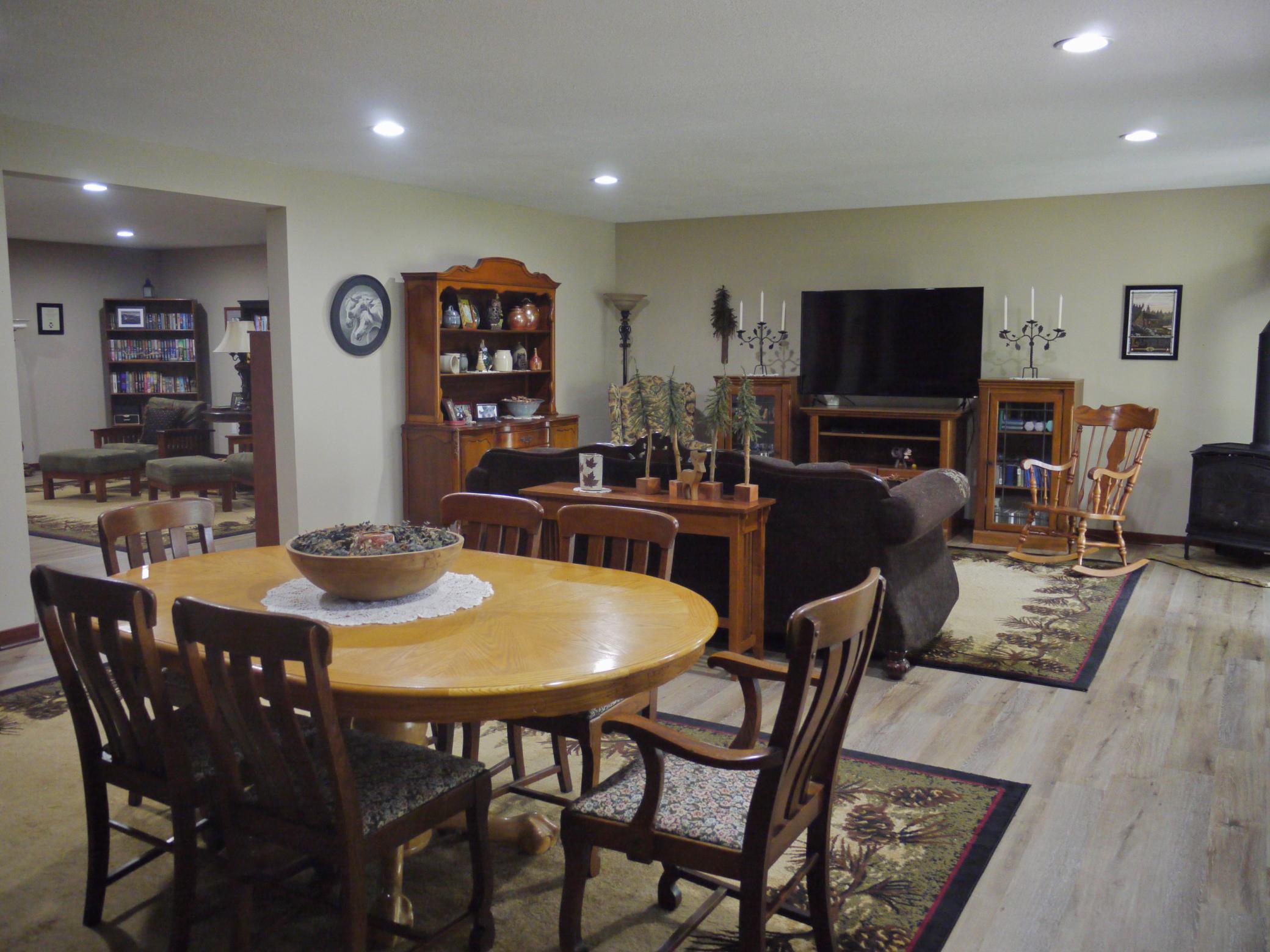 Long view of lower level family room showing library access.jpg