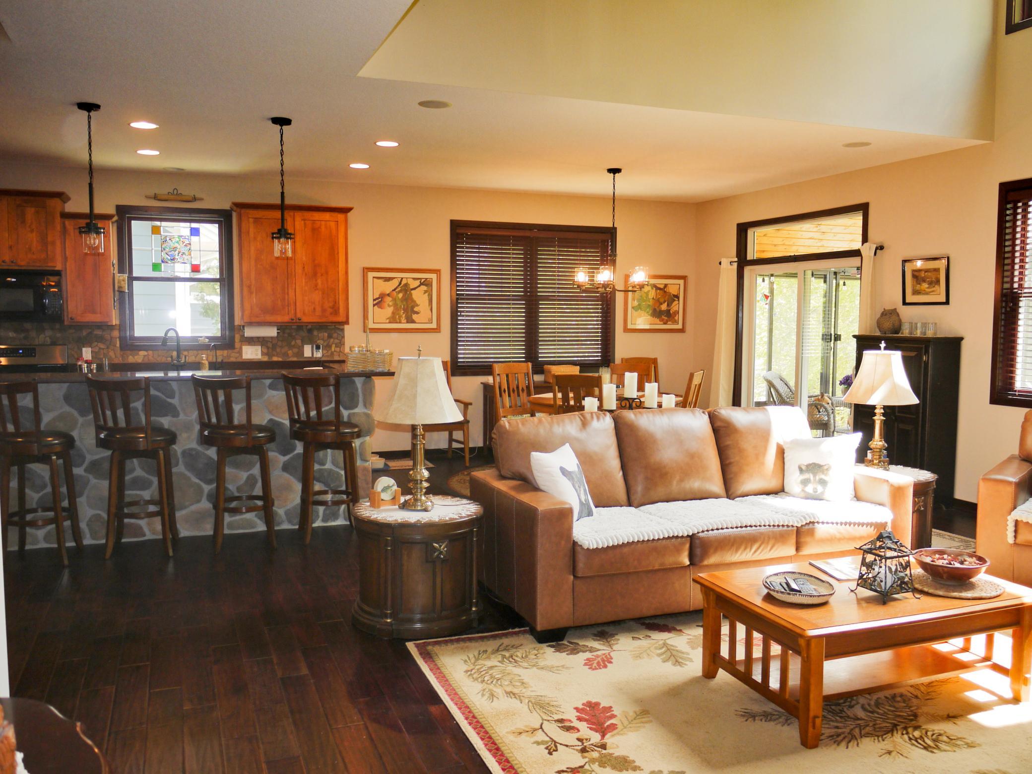 9 Alternate view across great room to kitchen and dining rooms.jpg