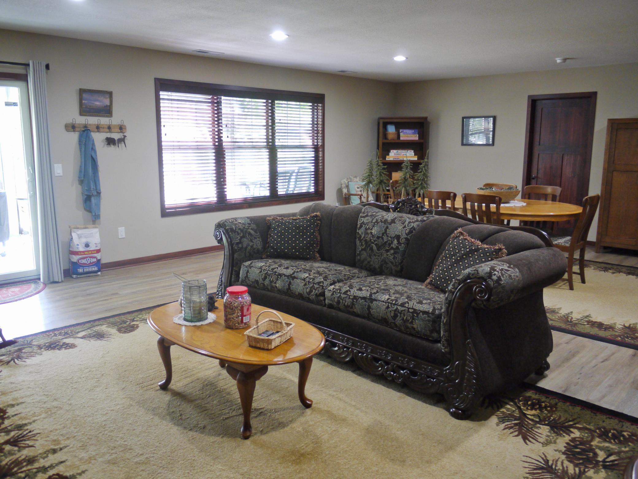 Reverse view across lower level family room.jpg