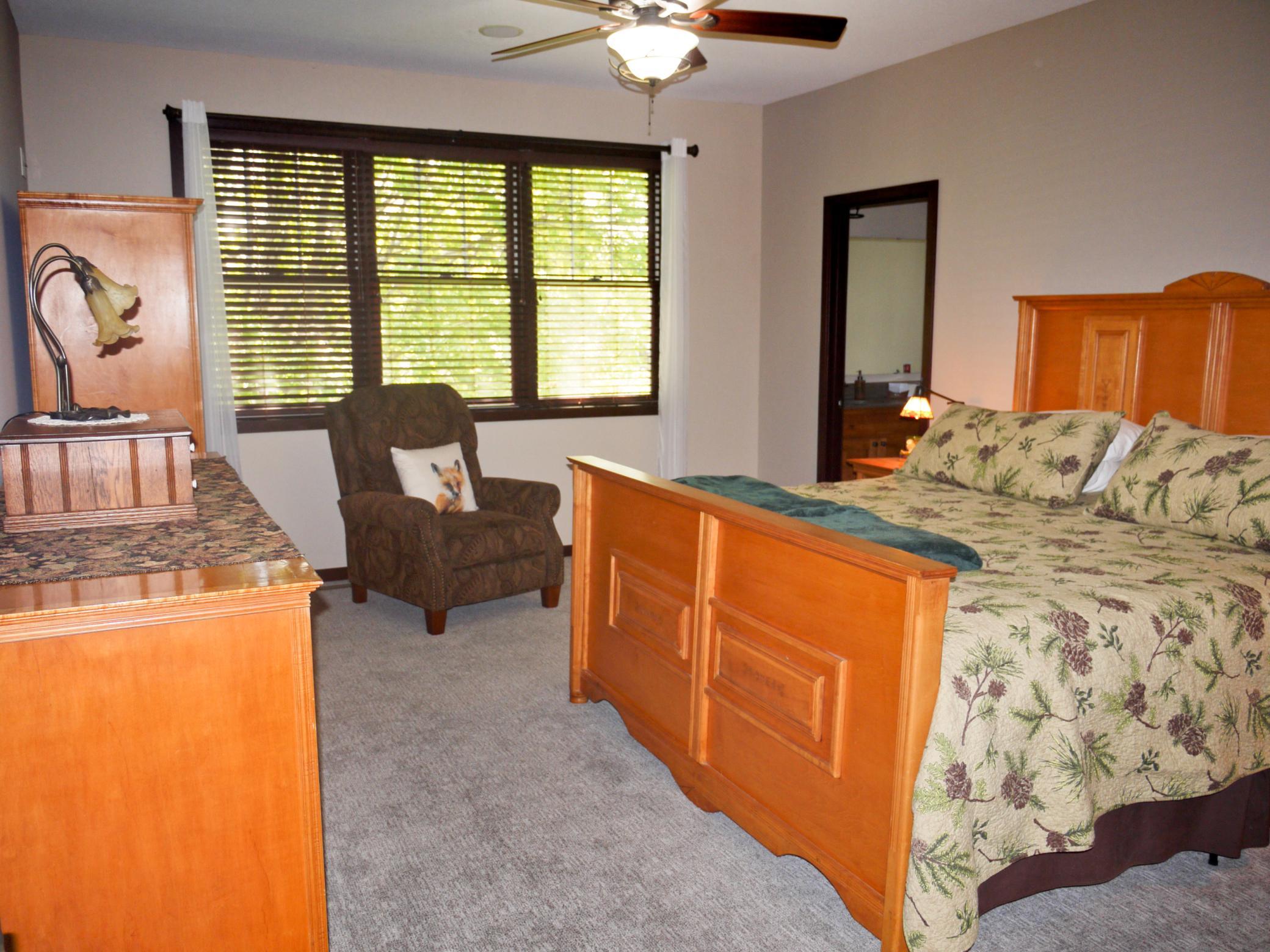 Main floor owners suite with private bath and walk-in closet.jpg