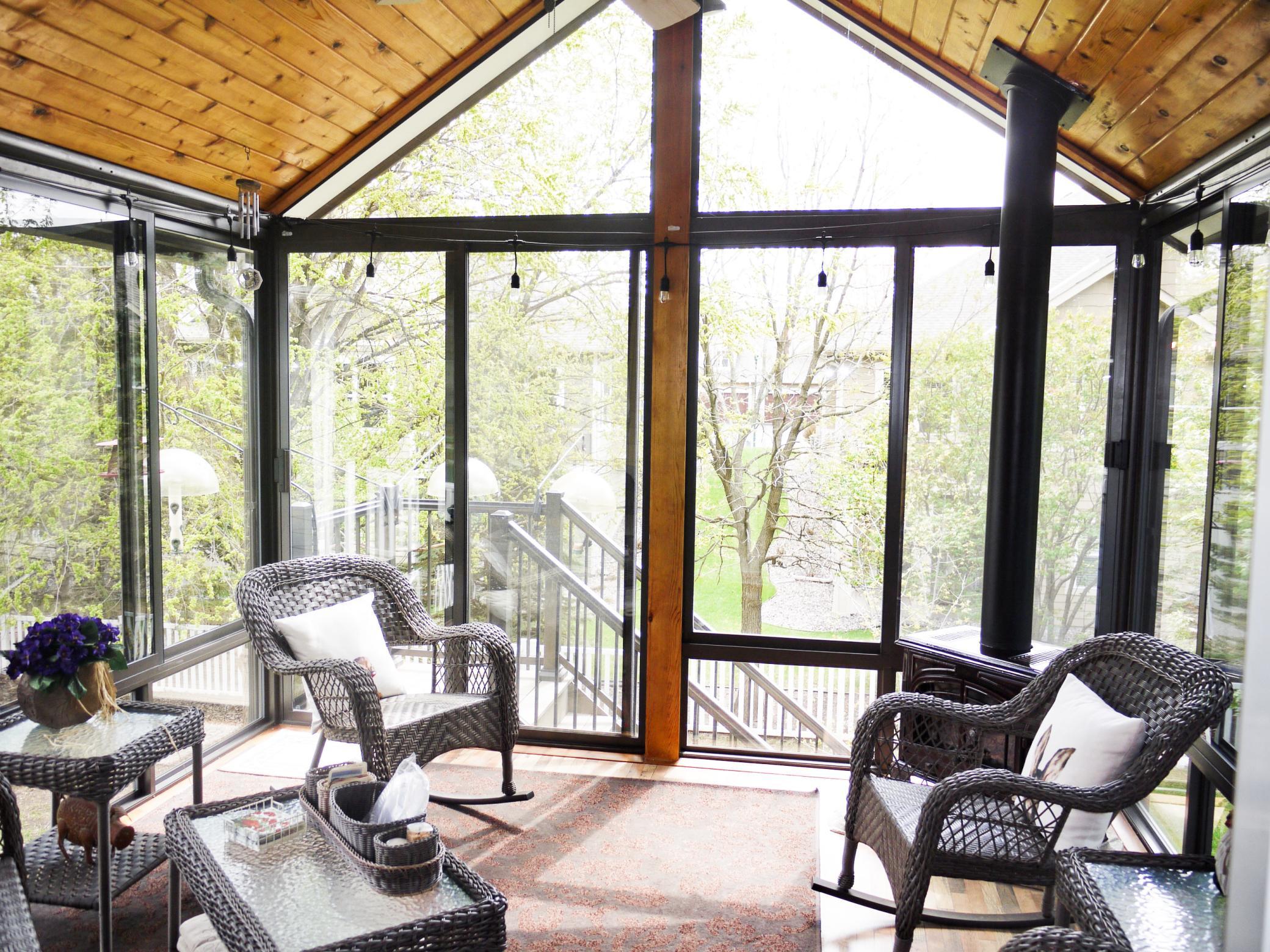 Three season porch with gas fired wood burning stove.jpg