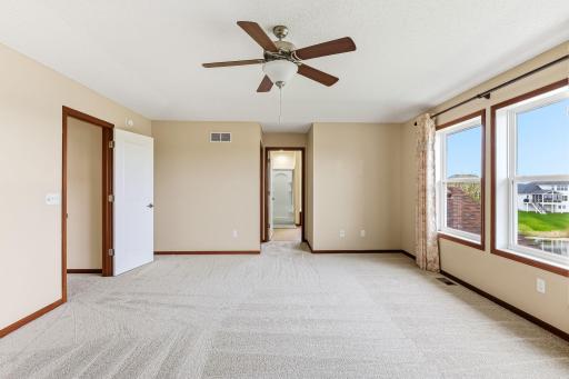 Spacious master bedroom with large picture windows and beautiful views-18849-64th-Ave-30.jpg