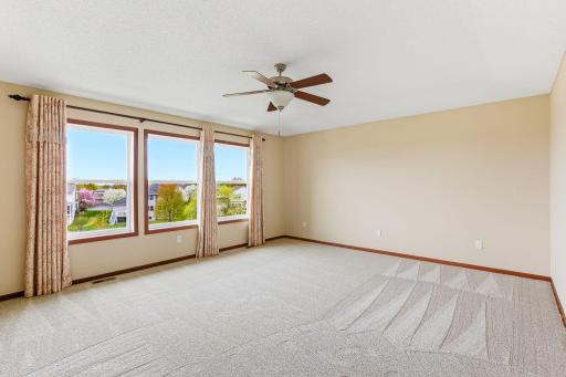 Spacious master bedroom with large picture windows and beautiful views -18849-64th-Ave-29.jpg