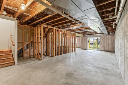 unfinished walkout basement offers over 1,000 sq ft of potential to expand your living space-18849-64th-Ave-42.jpg