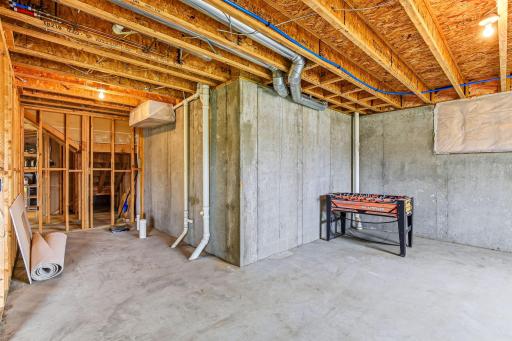 unfinished walkout basement offers over 1,000 sq ft of potential to expand your living space-18849-64th-Ave-44.jpg