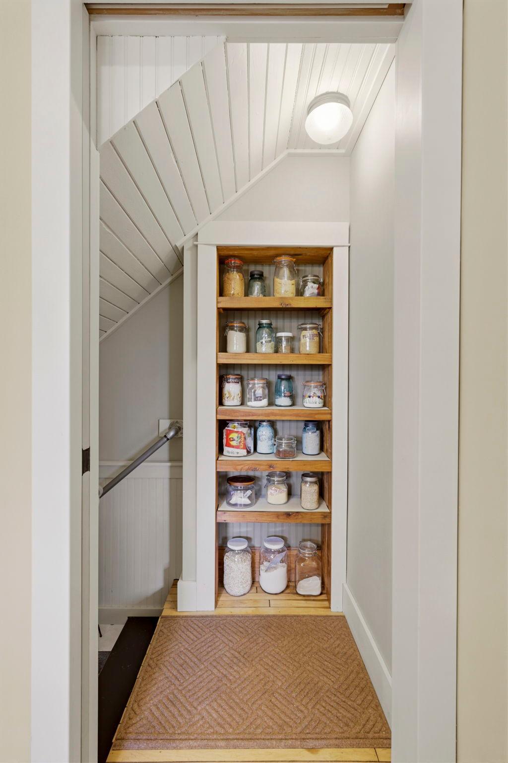 Clever built-in shelving makes the perfect pantry, display space, or organized storage nook.