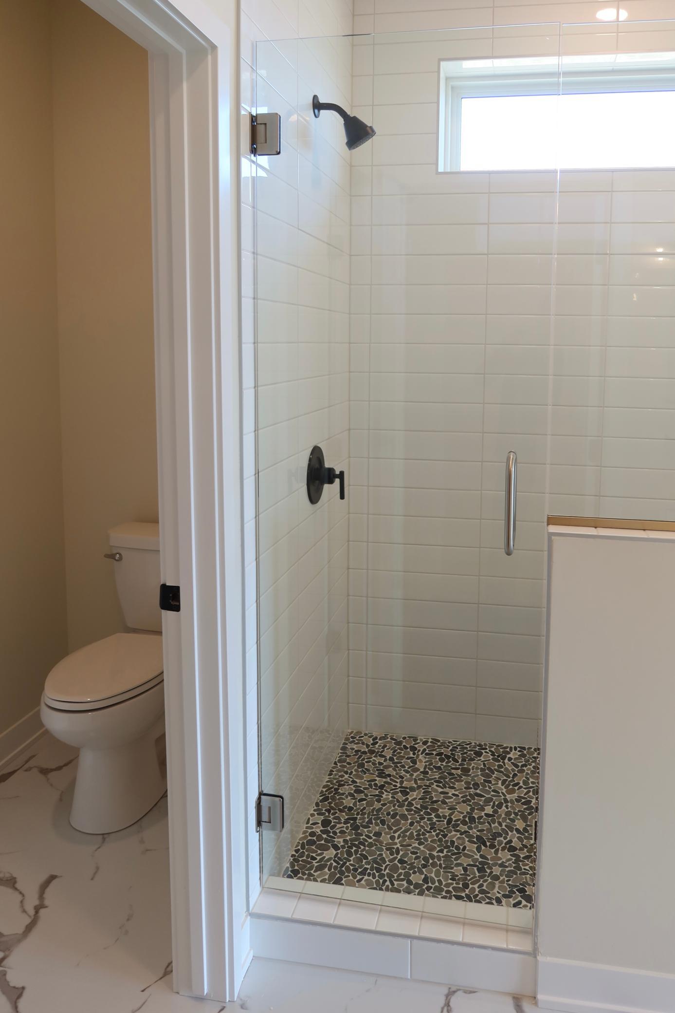 Primary Bath Tile Shower and Water Closet