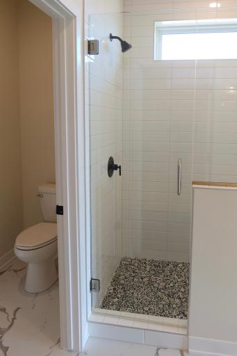 Primary Bath Tile Shower and Water Closet