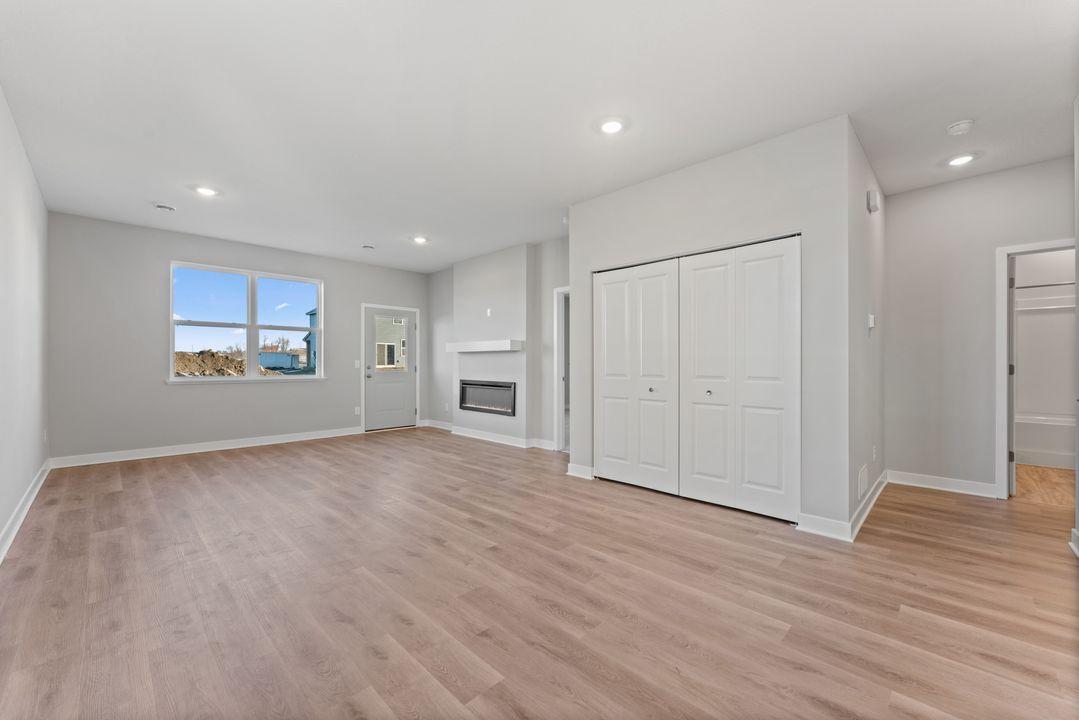 Open living spaces. *The laundry closet has been moved around the corner to the right. Spec home. Actual home is under construction - color and finish will vary.