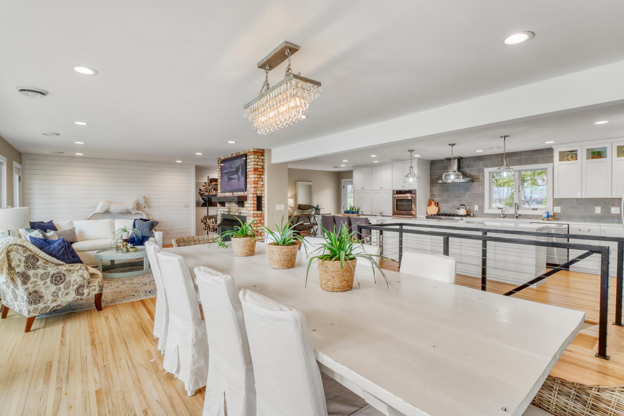 Dining looking to kitchen + living
