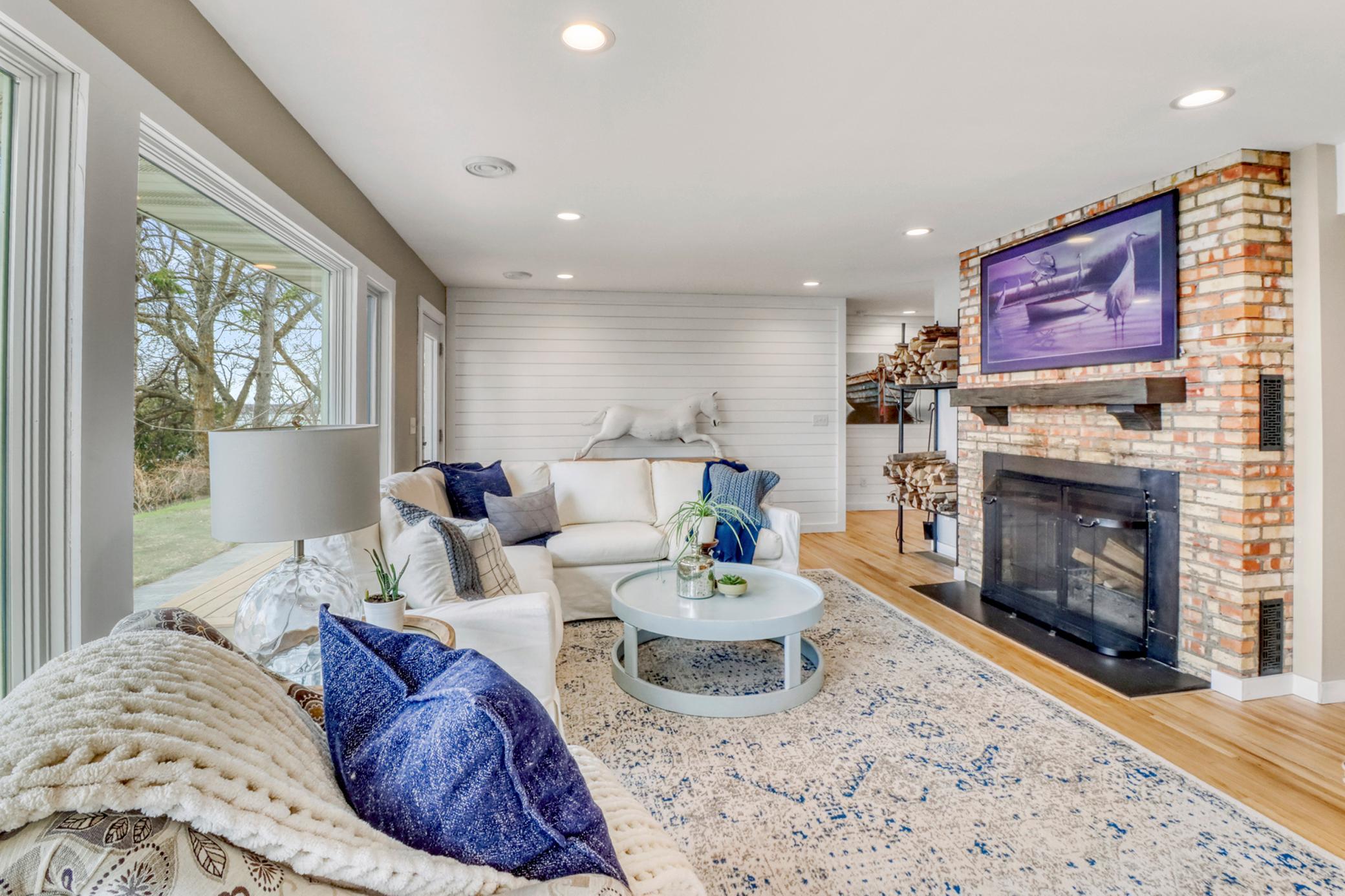 Livingroom w/ wood burning fireplace