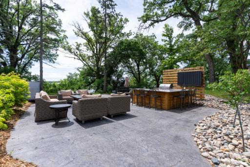 Outdoor entertainment area facing lake