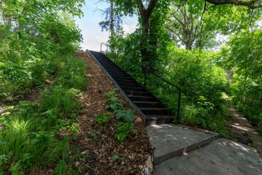 New steel stairway to landing from patio