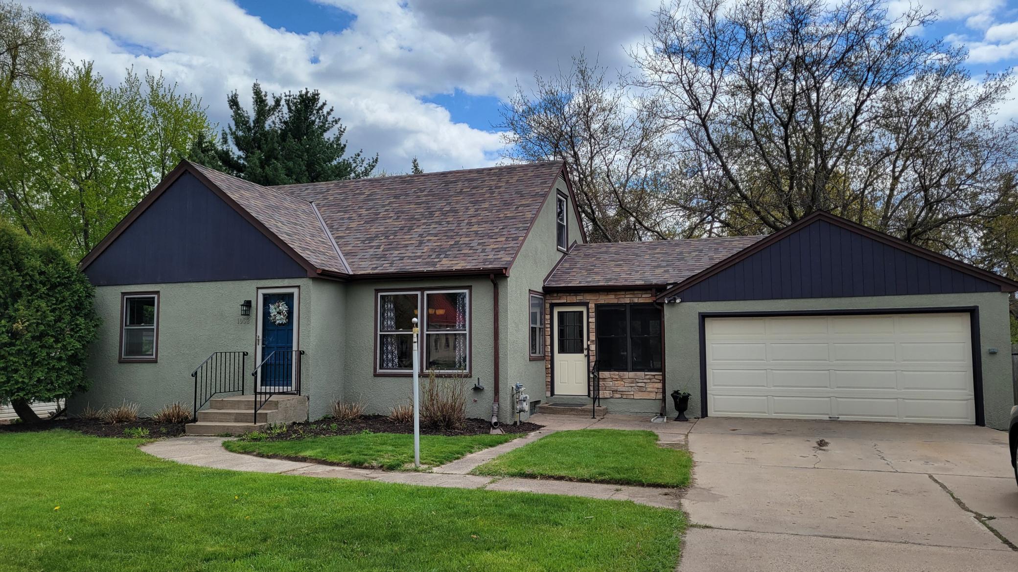 Welcome Home to 1052 County Road B W Roseville beautifully updated kitchen and upper level huge bedroom! Conveniently located close to everything in -only 1 block to Lexington Park and few block north of Hwy 36! Three season sunroom/mudroom too!