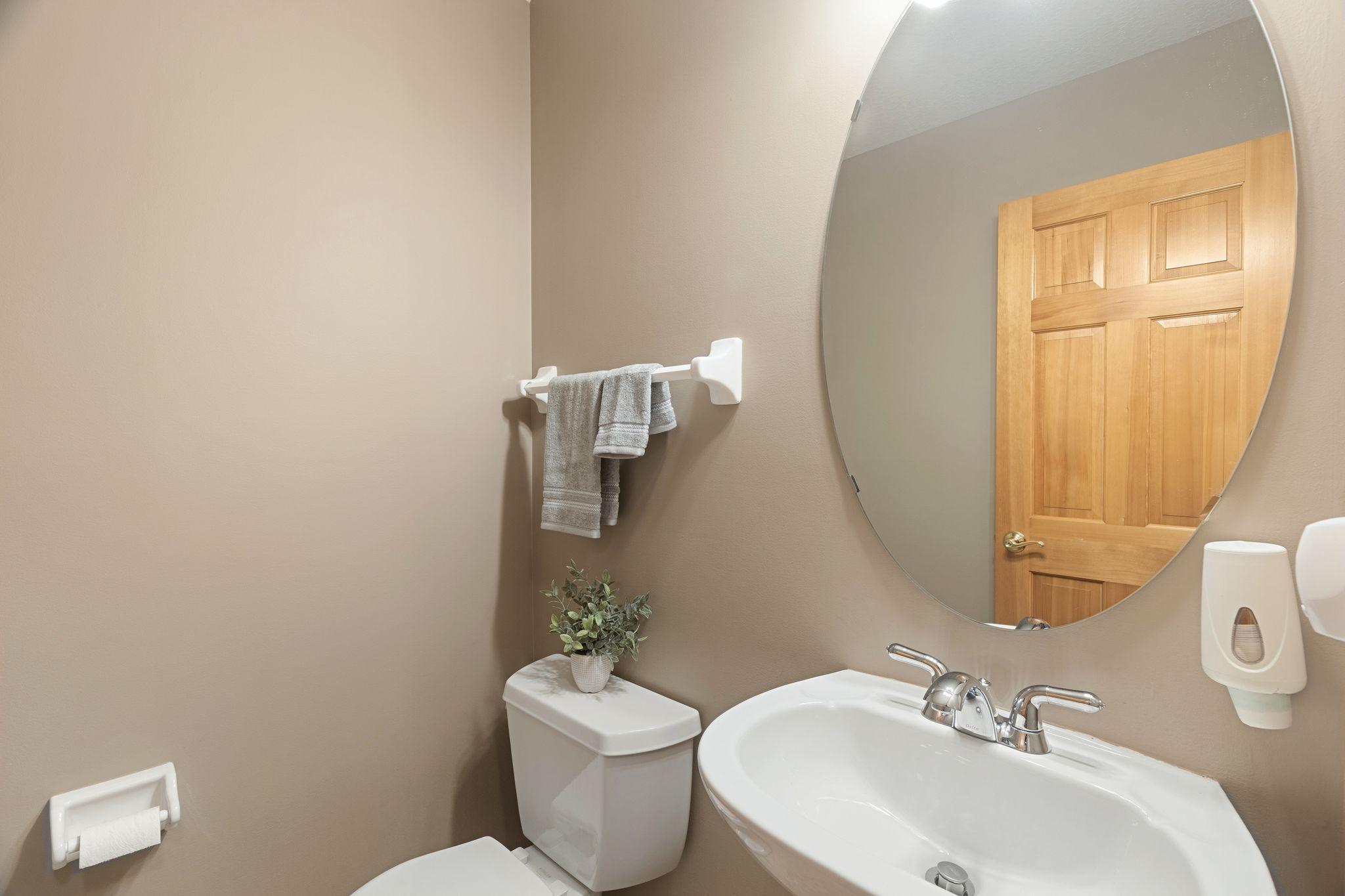 Convenient main floor powder room for guests.
