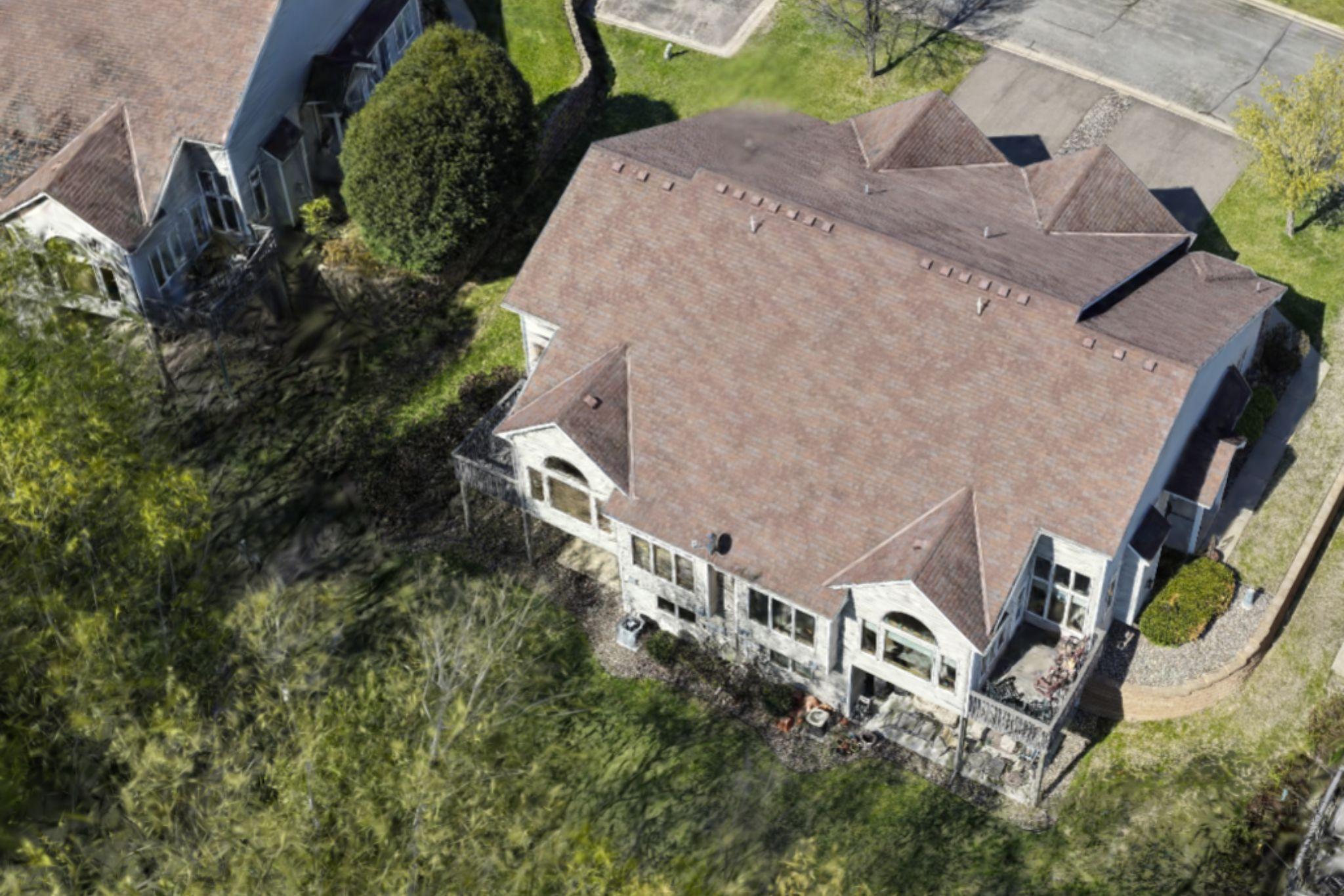 Overhead view of property and backyard