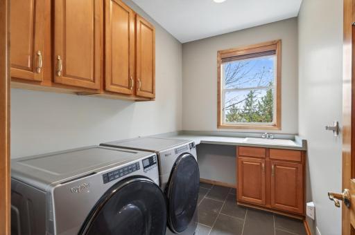 Main level laundry with new washer and dryer