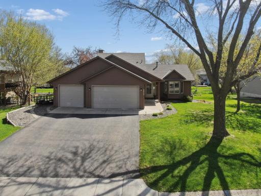 3-Car Garage and extra parking on side